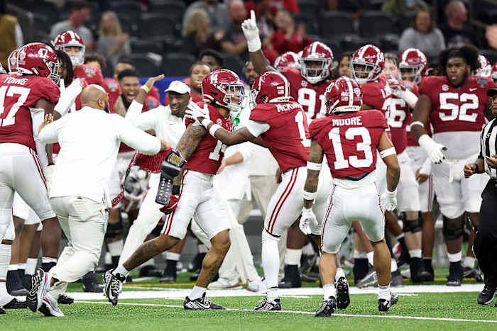 Alabama Crimson Tide defensive back Brian Branch (14) celebrates his interception against the Kansas State Wildcats during the second half in the 2022 Sugar Bowl at Caesars Superdome.